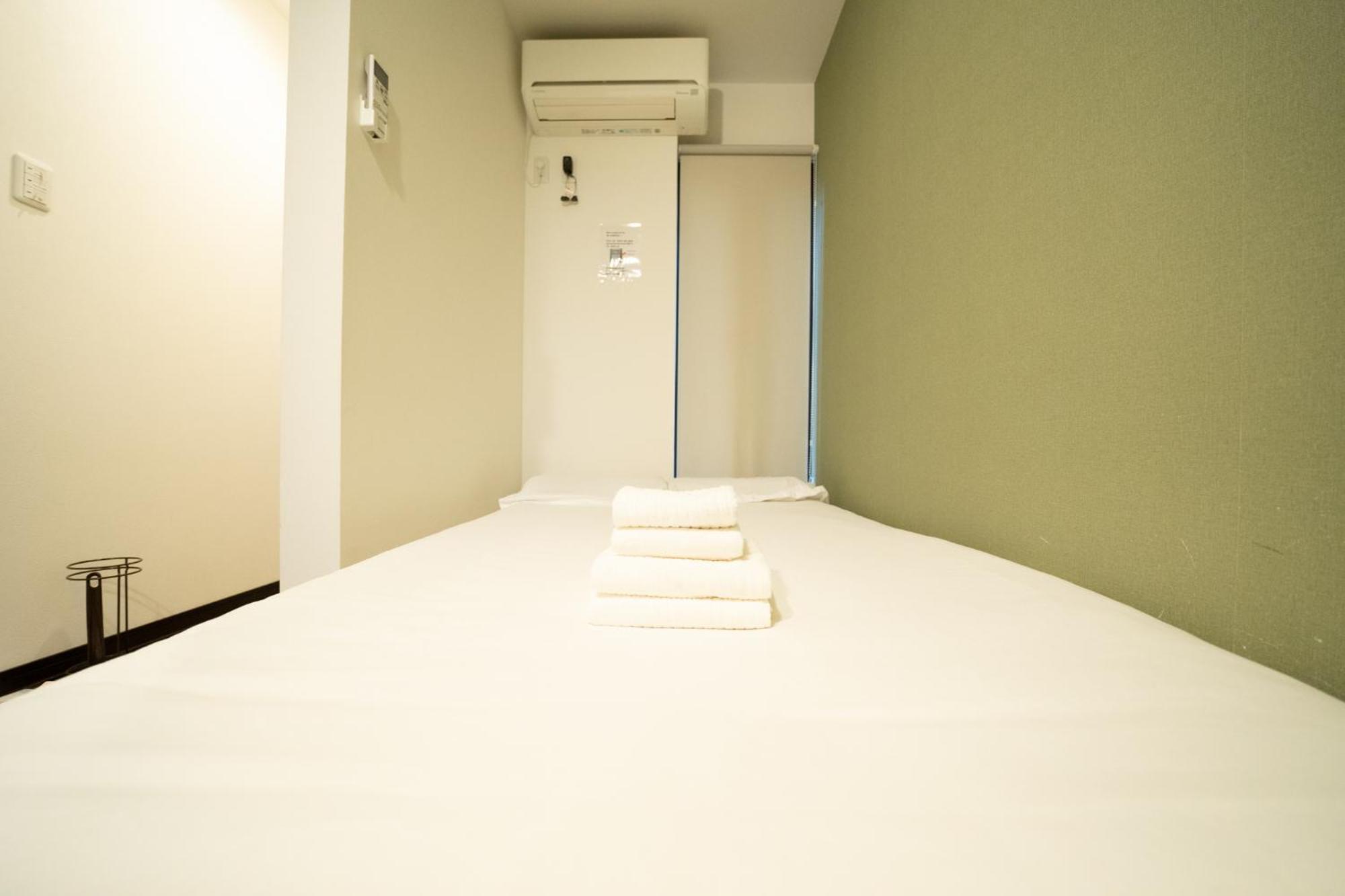 虹の宿101 Osaka Bagian luar foto